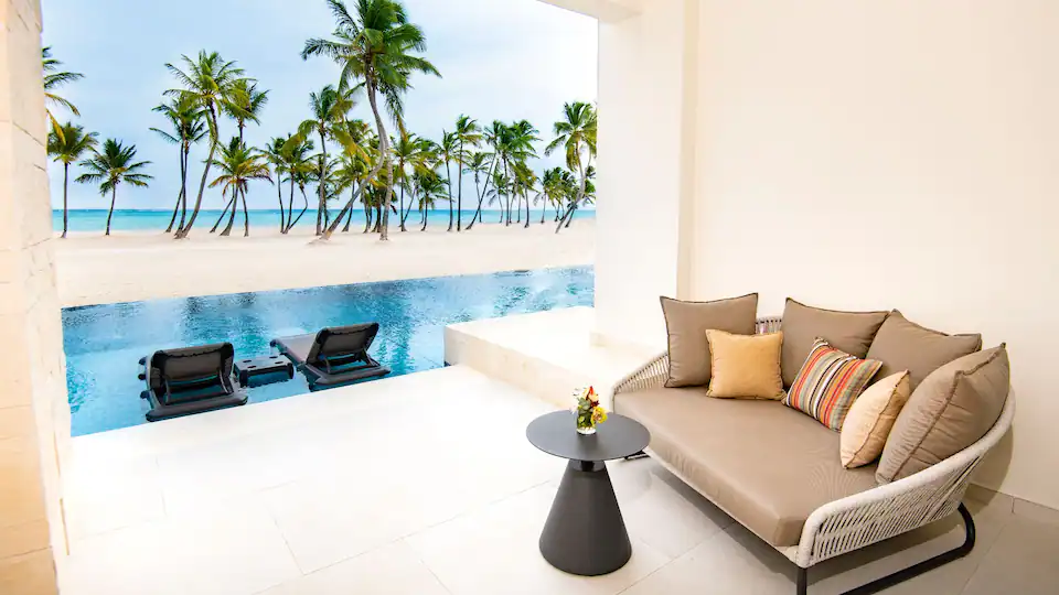 Oceanfront swim-up terrace with pool and Caribbean Sea views at Hyatt Zilara Cap Cana.