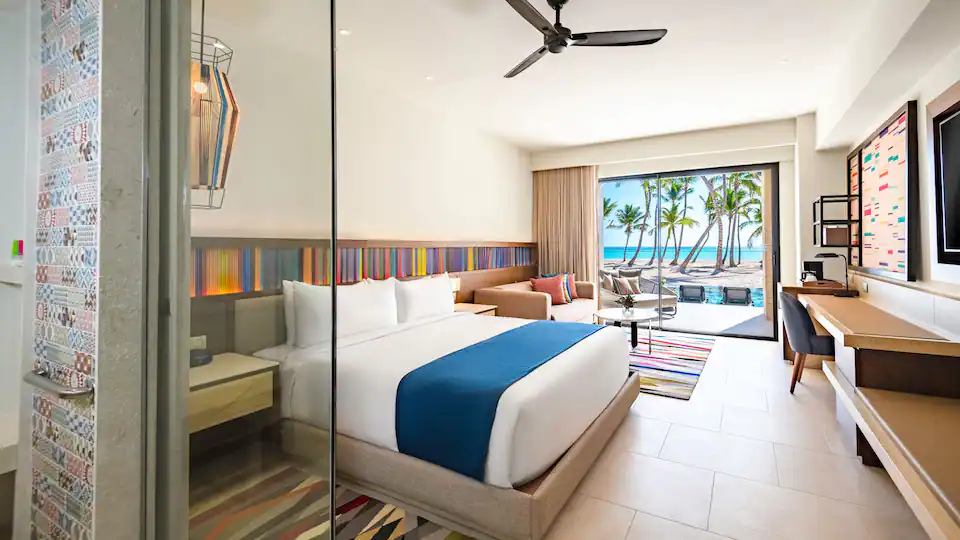 Club Oceanfront Junior Suite Swim-Up King with king bed and oceanfront swim-up terrace at Hyatt Zilara Cap Cana.