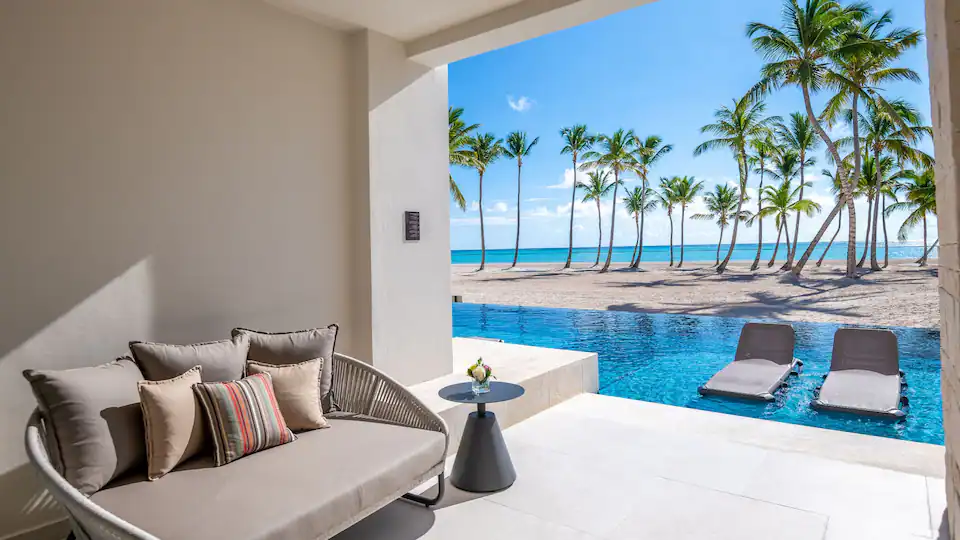 Private swim-up terrace with oceanfront pool and beach views at Hyatt Zilara Cap Cana.