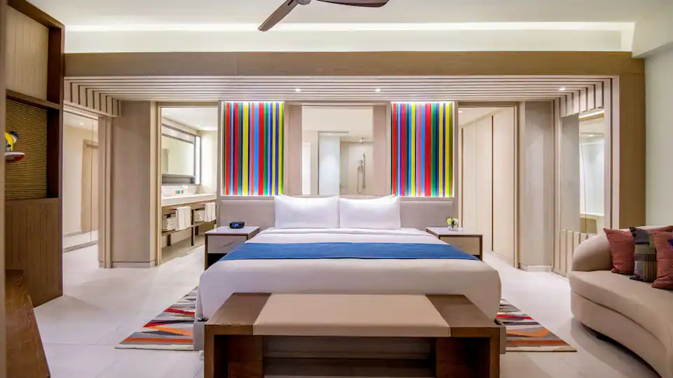Club One Bedroom Master Swim-Up Suite bedroom with king bed at Hyatt Zilara Cap Cana.