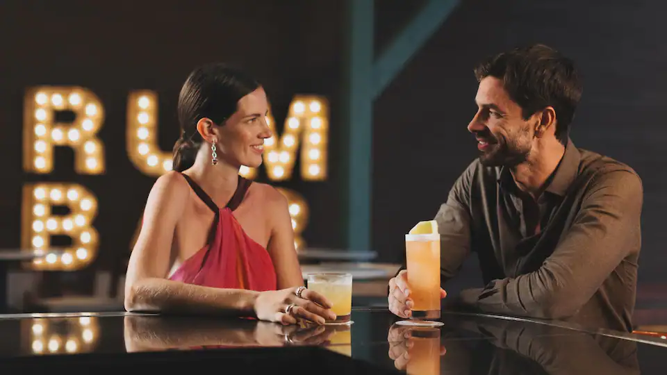 Grog Grotto bar at Hyatt Zilara Cap Cana featuring a cozy lounge atmosphere, premium spirits, handcrafted cocktails, and tropical-inspired décor.