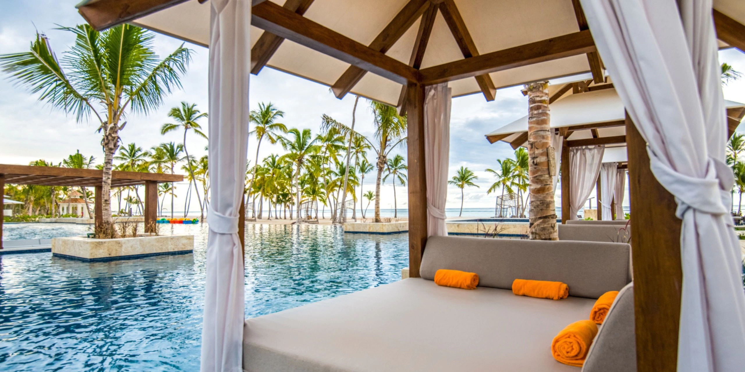 Luxury Bali bed cabana overlooking the pool and beach at Hyatt Zilara Cap Cana in Punta Cana.