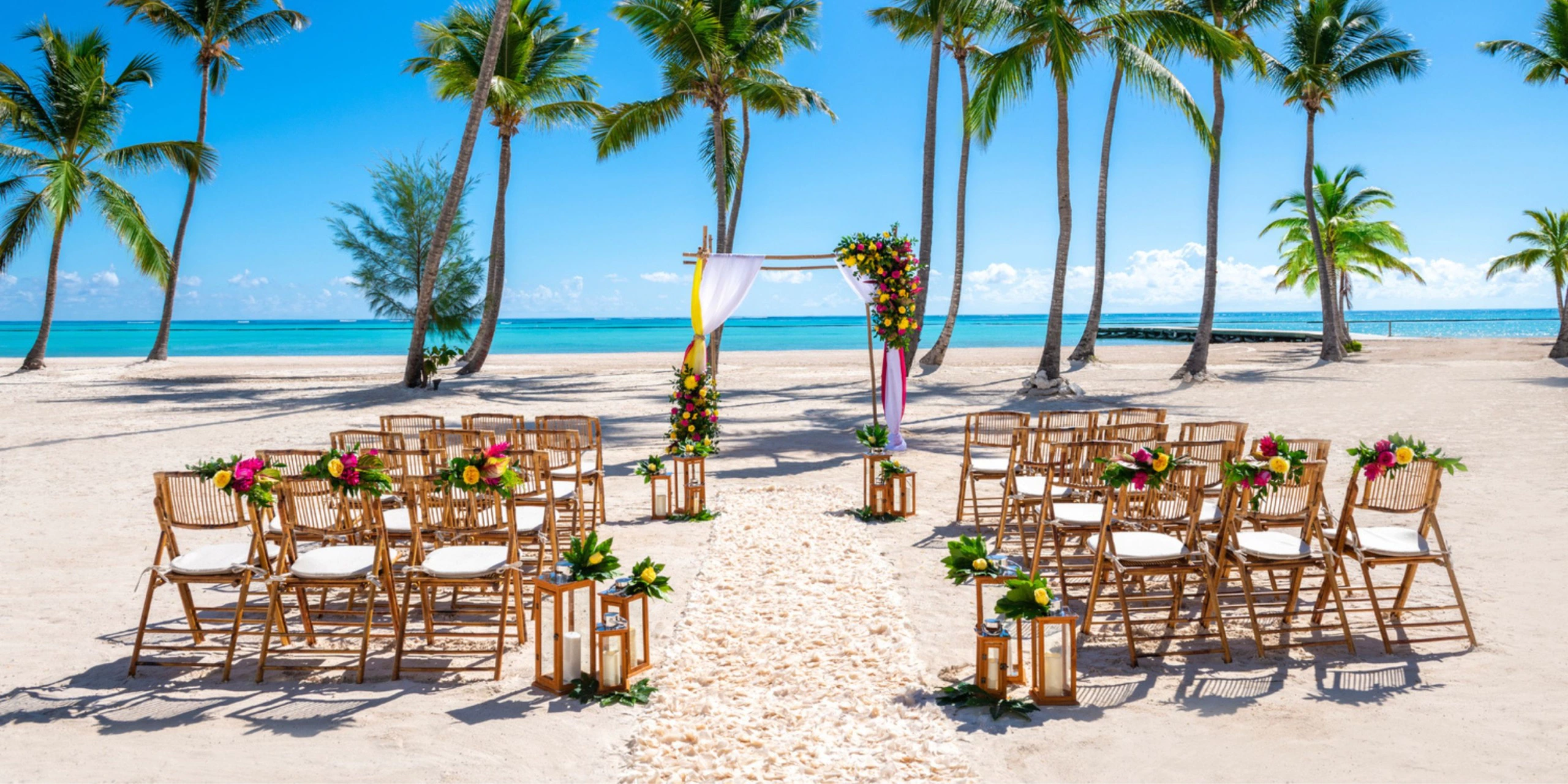 Beach wedding ceremony setup overlooking the Caribbean Sea at Hyatt Zilara Cap Cana in Punta Cana.