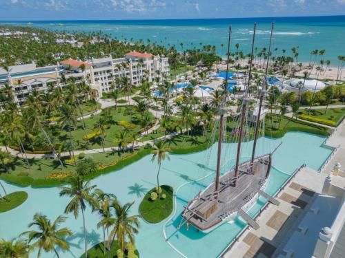 Iberostar Grand Bavaro luxury adults-only beachfront resort with elegant architecture and oceanfront pools in Punta Cana.