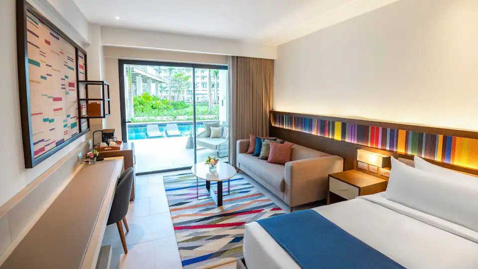 Junior Suite Swim-Up King bedroom with king bed and poolside terrace at Hyatt Zilara Cap Cana.