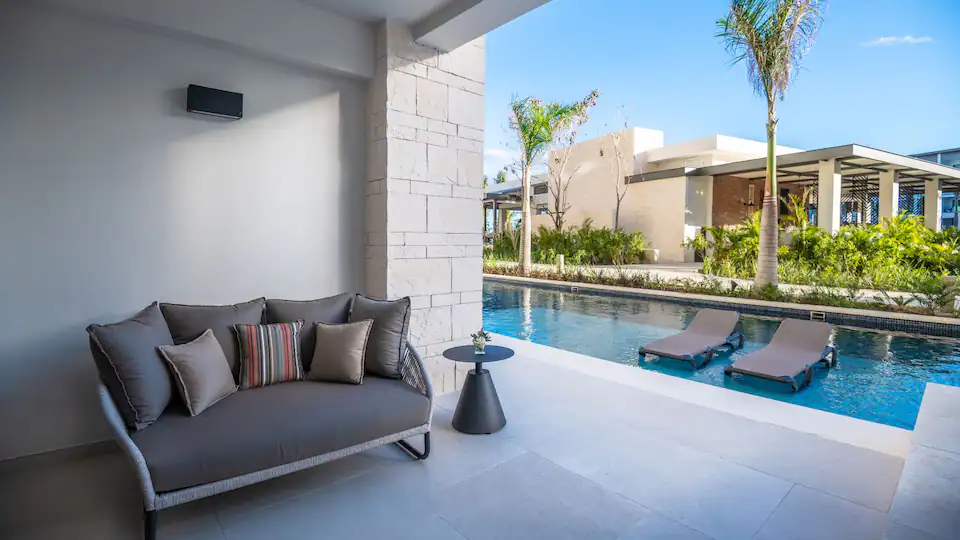 Private swim-up terrace with direct pool access from the Junior Suite Swim-Up King at Hyatt Zilara Cap Cana.