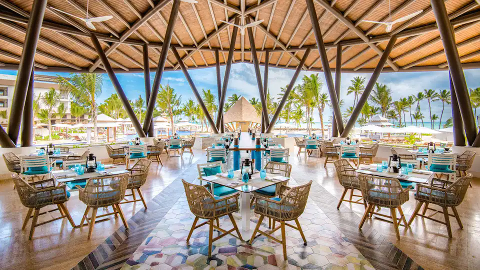 Navigator Grill at Hyatt Zilara Cap Cana featuring casual outdoor dining, grilled specialties, and scenic poolside surroundings.