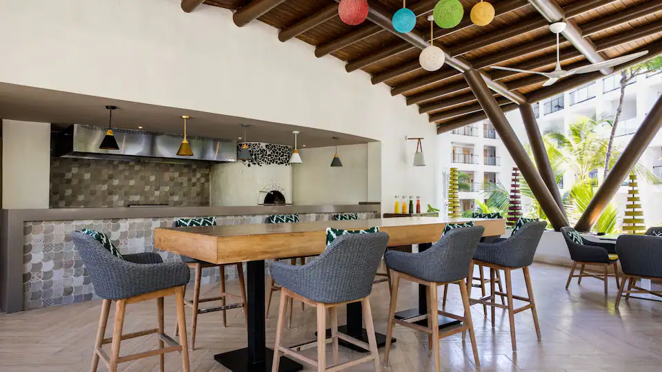 Prontoz café at Hyatt Zilara Cap Cana featuring freshly brewed coffee, pastries, light snacks, and a modern casual atmosphere.