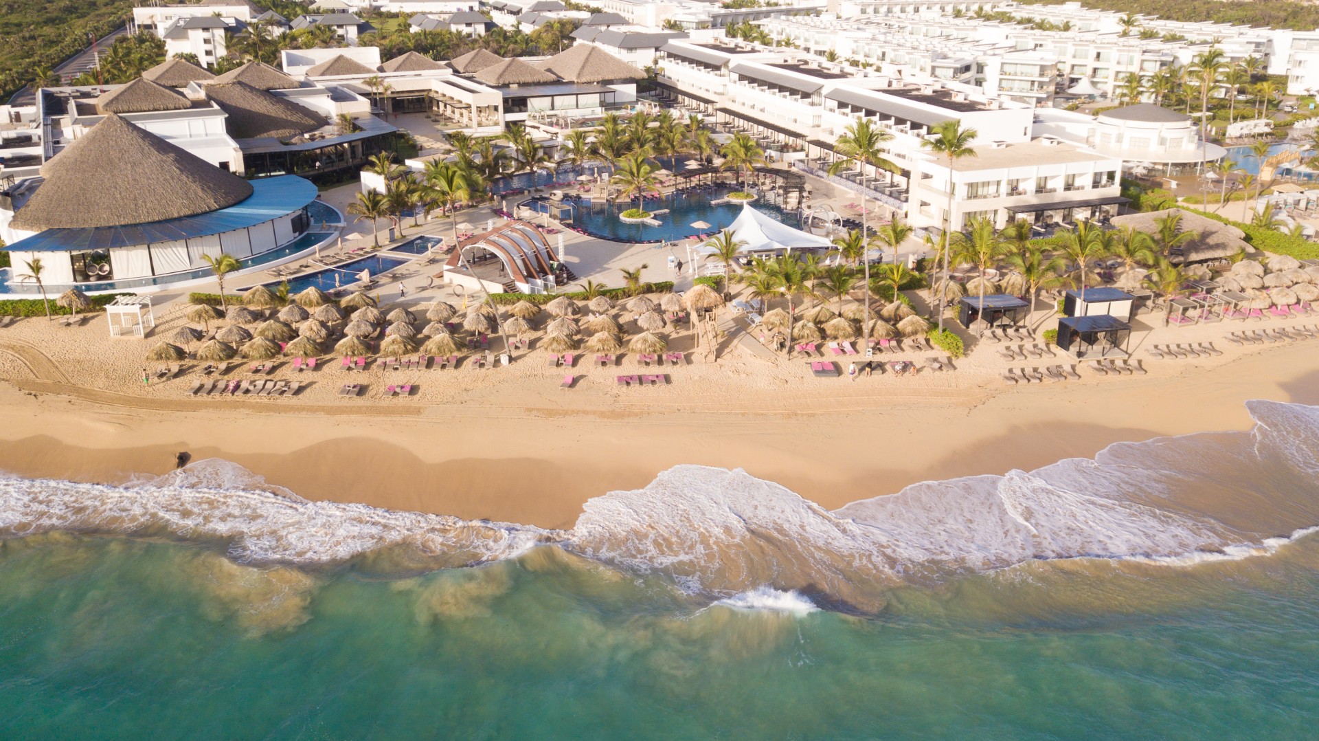 Royalton CHIC Punta Cana adults-only all-inclusive resort with beachfront pools and vibrant entertainment atmosphere.