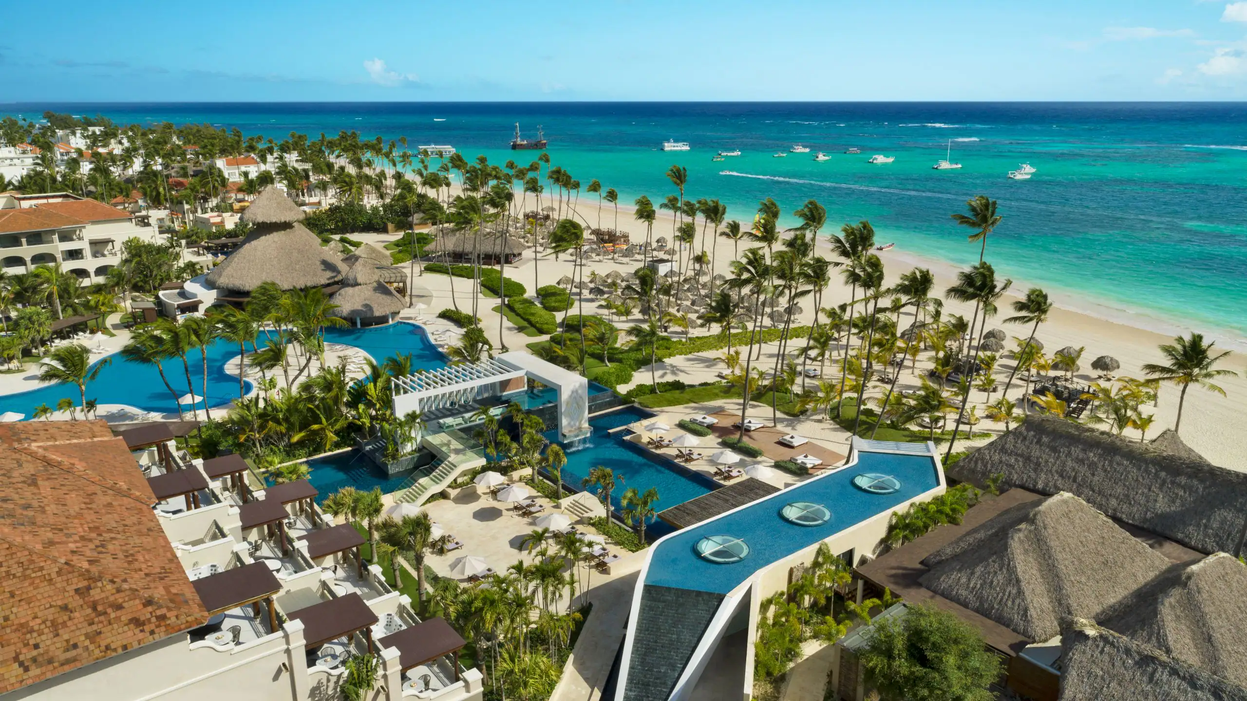 Secrets Royal Beach Punta Cana adults-only all-inclusive resort with tropical pools and beachfront setting.