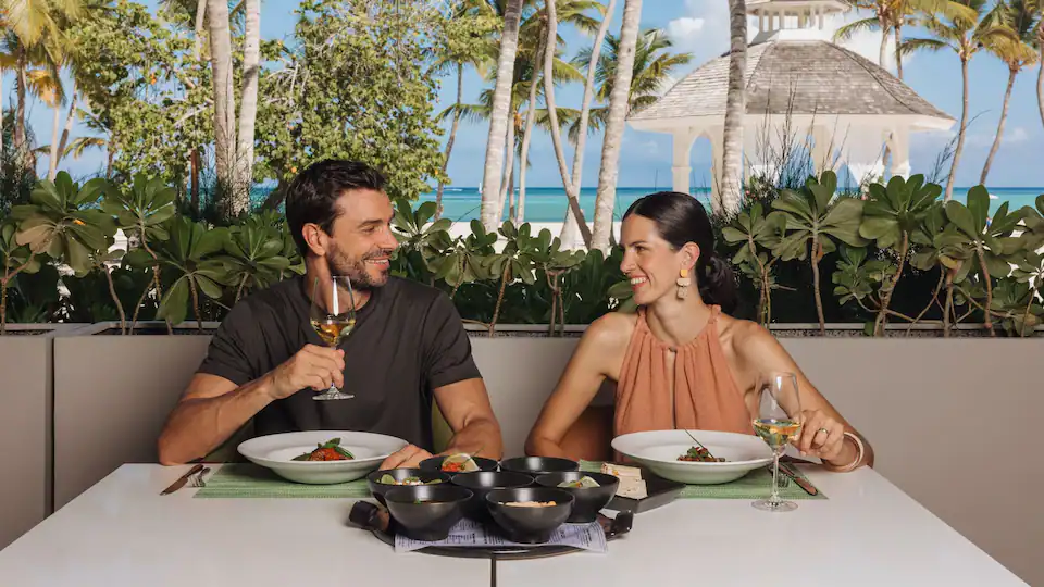 The Chinola bar at Hyatt Zilara Cap Cana featuring tropical cocktails, stylish lounge seating, and a vibrant Caribbean atmosphere.
